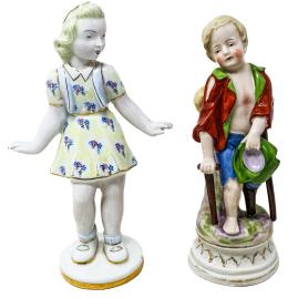 872  -  DOS FIGURITAS EN PORCELANA DE MEDIADOS DE S. XX