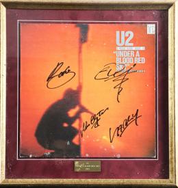 916  -  DISCO DE U2 "UNDER A BLOOD RED SKY" ENMARCADO Y CERTIFICADO