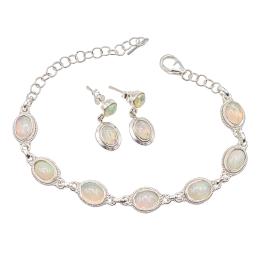 100  -  PULSERA Y PENDIENTES CON PIEDRAS LUNA