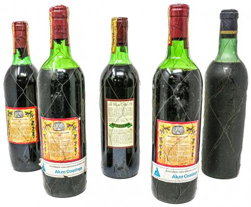 CINCO BOTELLAS DE VINO